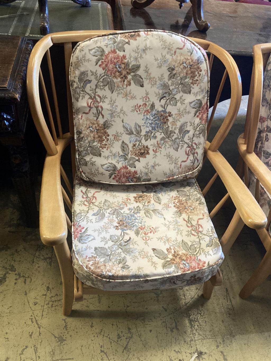An Ercol style beech two piece lounge suite, settee 116cm, depth 74cm, height 80cm